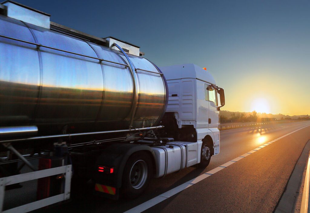 White truck transport on the road at sunset and cargo