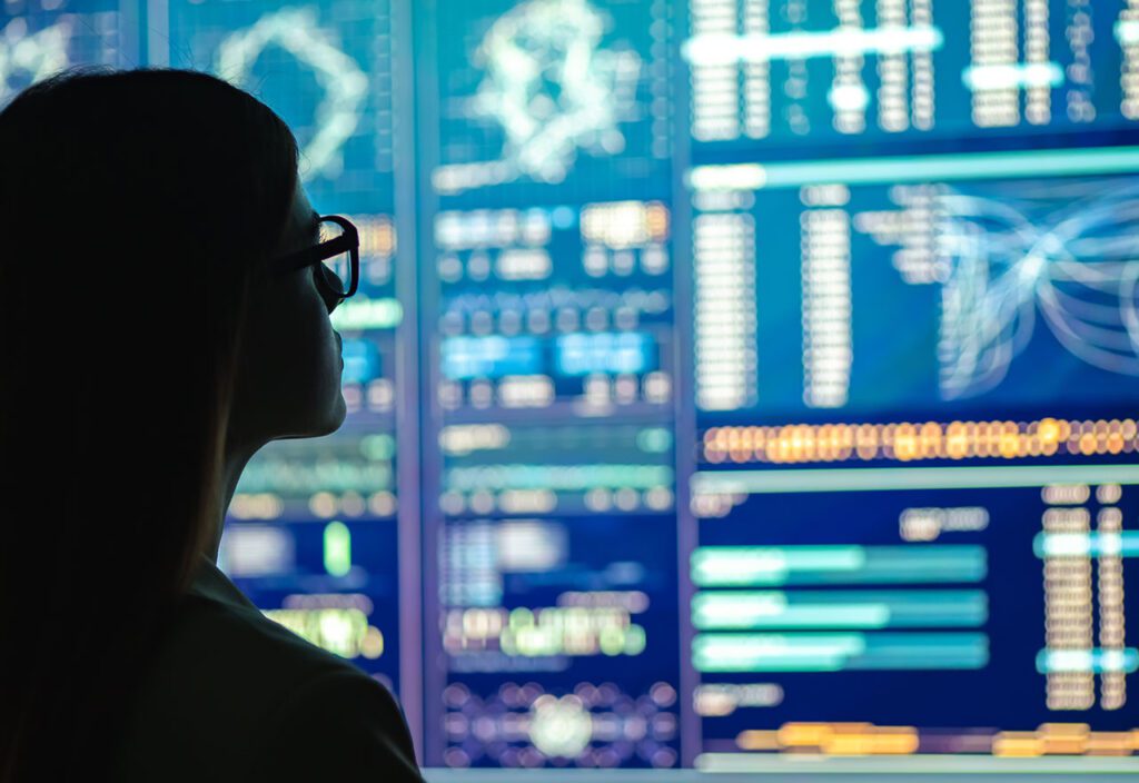 Female data scientist analyzing AI and machine learning data.